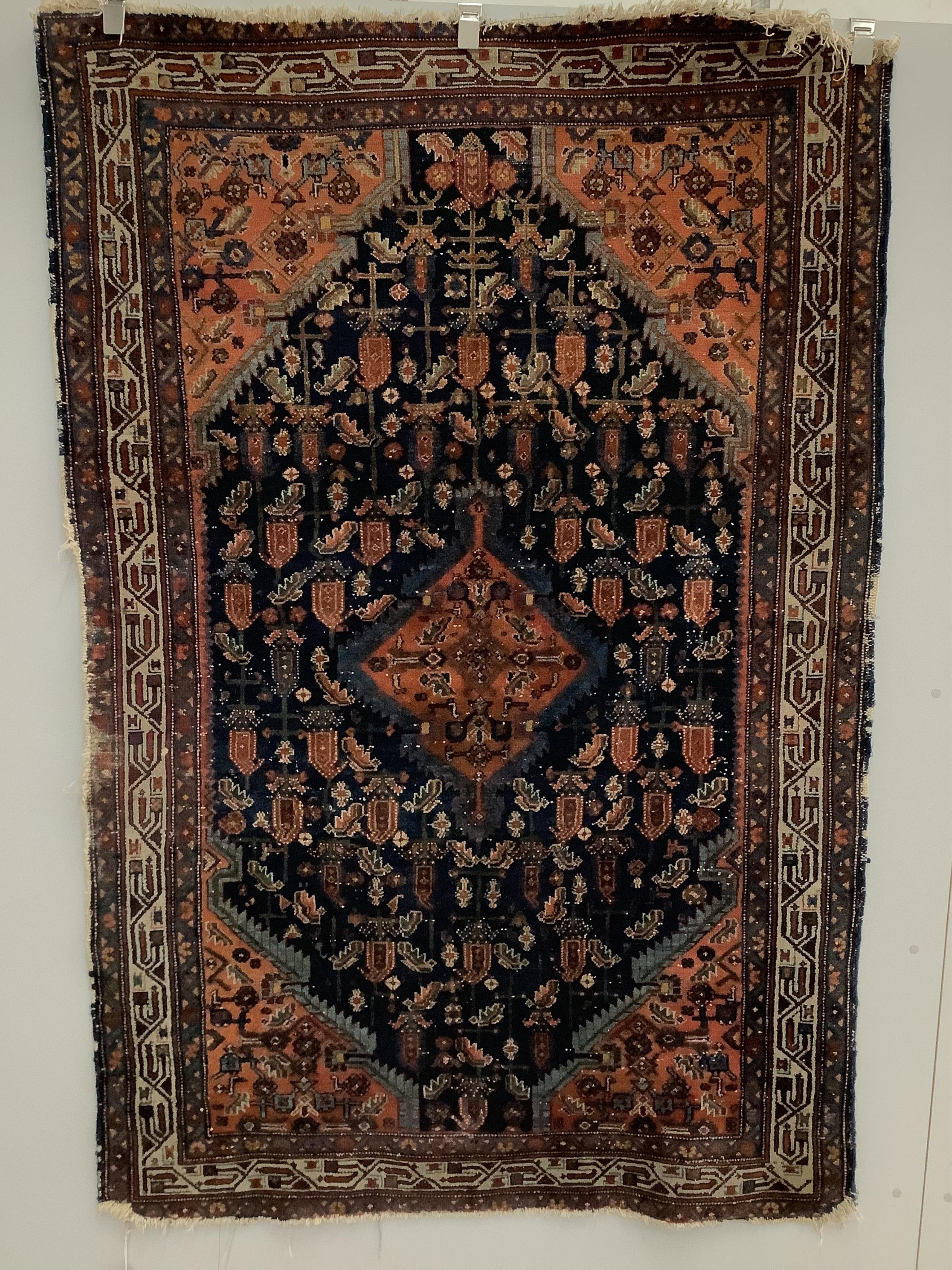 A North West Persian blue ground rug, 194 x 130cm. Condition - fair